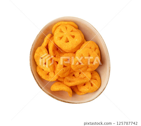 Corn puff snack isolated, crunchy cereal nosh, crispy yellow rice breakfast with paprika 125787742