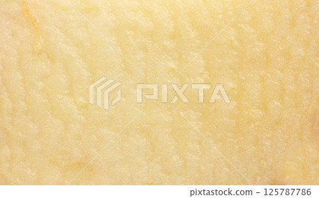 Apple cut macro texture. Fresh juicy apple slice 125787786