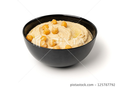 Hummus in bowl, houmous dip, chickpea humus tahini sauce, middle eastern spread 125787792