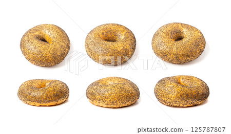 Poppy Seed Bagel Isolated, One Round Bread Bun, Poppyseed Wheat Bakery for Breakfast Poppy Seed Bagel Isolated, One Round Bread Bun, Poppyseed Wheat Bakery for Breakfast 125787807