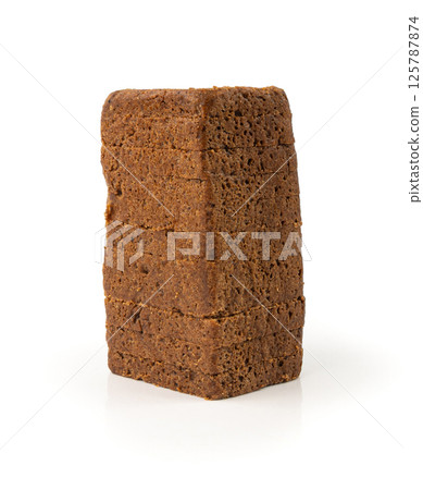 Black rye bread isolated, dark brown sliced loaf, sourdough borodinsky rugbrod square slices 125787874