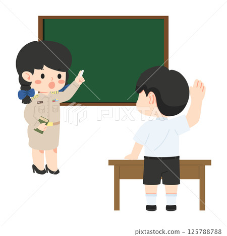 Teacher Interacting with Student in Classroom 125788788