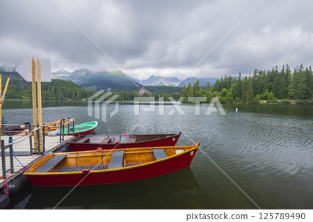 Strbske pleso lake with High Tatras mountains in summer time, Slovakia Strbske pleso lake with High Tatras mountains in summer time, Slovakia 125789490