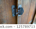 Old door and key 125789713
