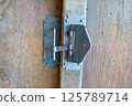 Old door and key 125789714