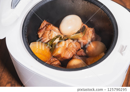 Braised pork in a rice cooker Braised pork in a rice cooker 125790295