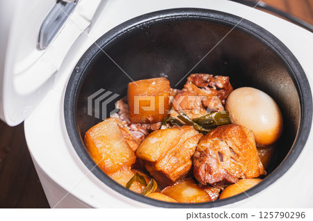 Braised pork in a rice cooker Braised pork in a rice cooker 125790296
