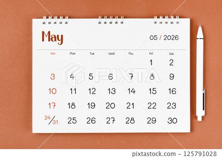 May 2026 Monthly desk calendar for 2026 year and pen. 125791028