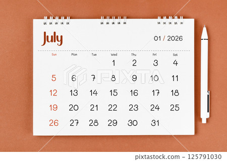 July 2026 Monthly desk calendar for 2026 year and pen. July 2026 Monthly desk calendar for 2026 year and pen. 125791030