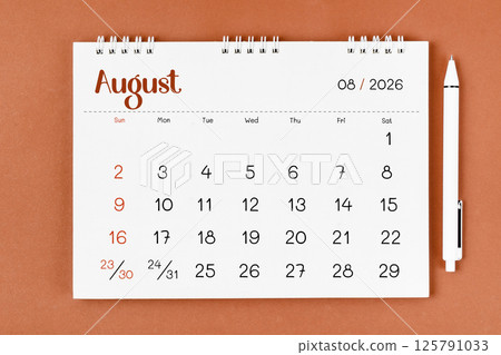 August 2026 Monthly desk calendar for 2026 year and pen. 125791033