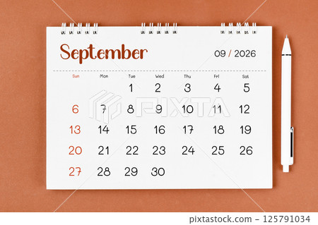 September 2026 Monthly desk calendar for 2026 year and pen. 125791034