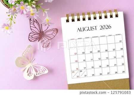 August 2026 desk calendar for the organizer to plan and reminder and paer butterfly on pink background. 125791083