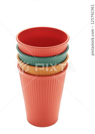 Eco plastic glass of various color isolated on white background Eco plastic glass of various color isolated on white background 125792361