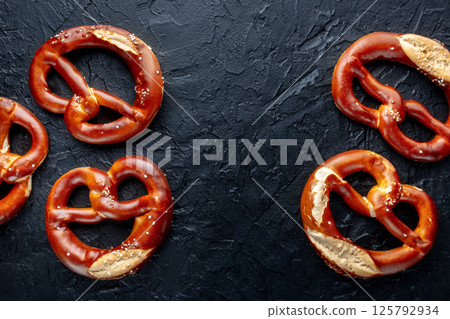 Pretzel or Bretzel, traditional German beer snack, a salty wheat bread 125792934