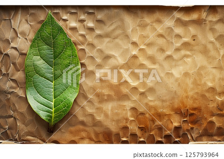 Eco friendly brown paper honeycomb wrap with green leaf for sustainable product packaging solutions 125793964