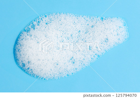 Texture of white foam. Cleansing mousse for the face or bath foam or washing powder. 125794070