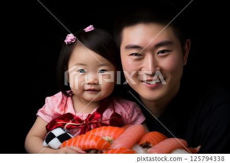 Multinational Family Bonding over Exquisite Sushi Delights in a Warm and Inviting Sushi Bar 125794338