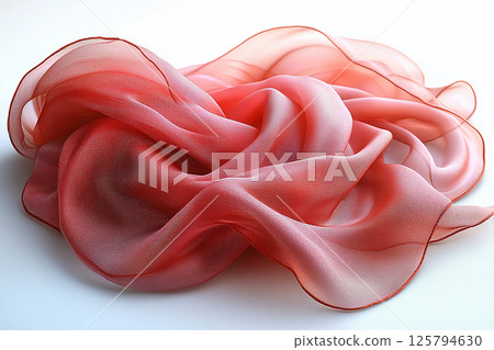 Elegant silk scarf with soft, flowing folds, highlighting its luxurious texture against a simple white background. Elegant silk scarf with soft, flowing folds, highlighting its luxurious texture against a simple white background. 125794630
