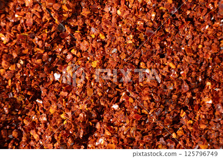 Macro Texture of Ground Chili Pepper Top View Macro Texture of Ground Chili Pepper Top View 125796749