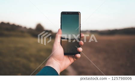 Smartphone Held In Hand 125798006