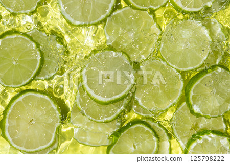 Green Lime Slices. Water Ripple Effect Green Lime Slices. Water Ripple Effect 125798222
