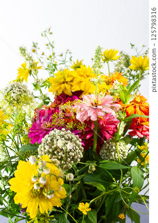 Summer bouquet of seasonal flowers Summer bouquet of seasonal flowers 125798316