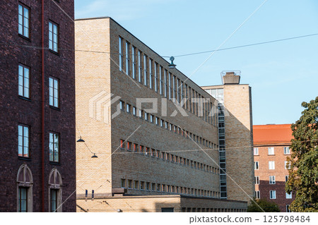 An urban view of diverse architectural styles in Helsinki's buildings under a blue sky. 125798484