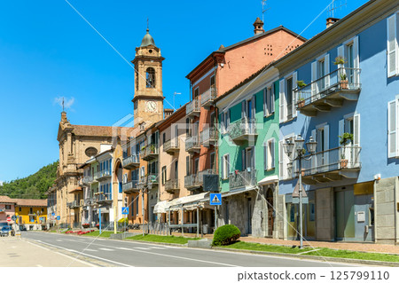 A vibrant street scene and colorful buildings in Corneliano d'Alba, Piedmont, Italy. 125799110