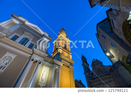 Low angle view of the Basilica of Saint Michel Archange in Menton, France. 125799121