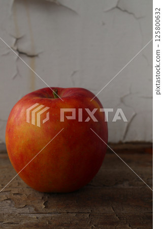 Ripe apple of the Honey Crisp variety. Ripe apple of the Honey Crisp variety. 125800632