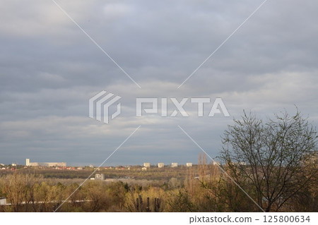 Beautiful cityscape with cloudy sky. Beautiful cityscape with cloudy sky. 125800634