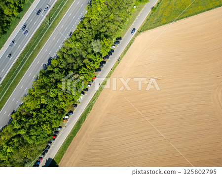 E19, Halle, Vlaams Brabant, Belgium, 27th of April, 2025, An aerial view showcasing the highway E19, Halle, Vlaams Brabant, Belgium, 27th of April, 2025, An aerial view showcasing the highway 125802795