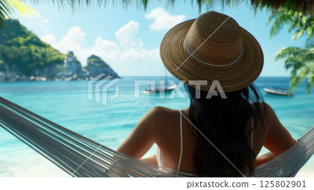 young woman with brunette hair and hat relaxing in hammock on tropical beach. rear view. Summer vacations concept young woman with brunette hair and hat relaxing in hammock on tropical beach. rear view. Summer vacations concept 125802901