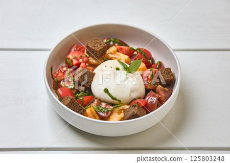 Fresh Burrata Salad with Heirloom Tomatoes Fresh Burrata Salad with Heirloom Tomatoes 125803248