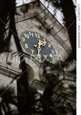 Old clock on the Church in Niksic, Montenegro 125805077