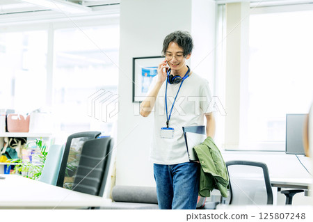 Working male engineer Working male engineer 125807248