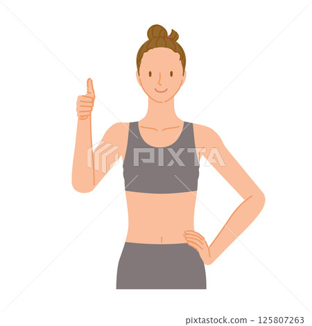 Gym trainer (smiling young woman): thumbs up good sign 125807263