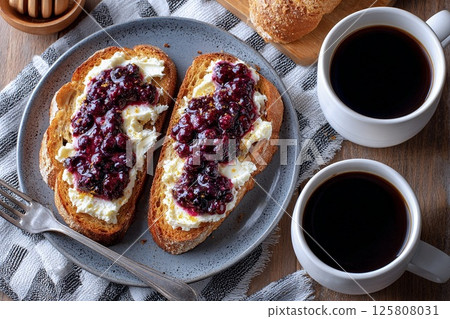 Toast with cream cheese and blueberry sauce Toast with cream cheese and blueberry sauce 125808031