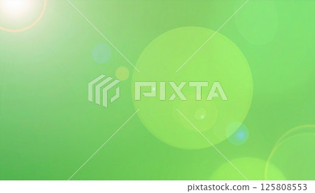 peaceful green abstract gradient background featuring subtle light flares and organic bokeh shapes, creating serene and calming atmosphere 125808553