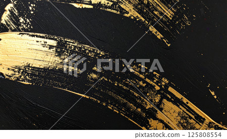 Elegant abstract black canvas with sweeping golden brush accents, showcasing metallic texture that adds depth and sophistication to any space 125808554