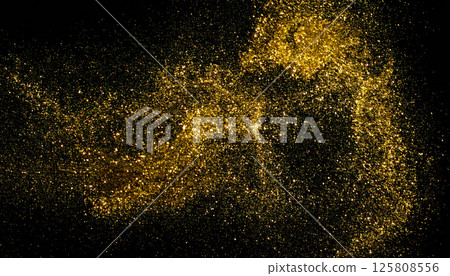 Golden particles create mesmerizing glittering effect against black background, evoking sense of glamour and celebration. This radiant display resembles storm of shimmering light 125808556
