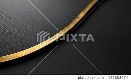 sleek, sophisticated design featuring metallic gold curved detail against matte black surface, creating high end aesthetic that exudes elegance and modernity sleek, sophisticated design featuring metallic gold curved detail against matte black surface, creating high end aesthetic that exudes elegance and modernity 125808674