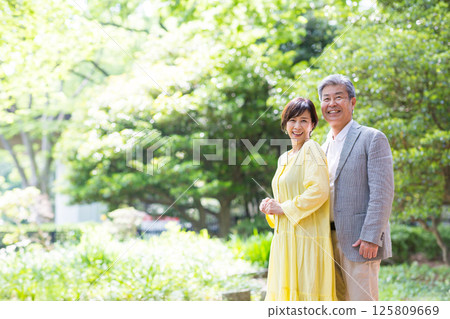 Senior couple enjoying the fresh greenery, couple, middle-aged, date, walk 125809669