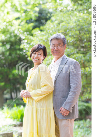 Senior couple enjoying the fresh greenery, couple, middle-aged, date, walk 125809696