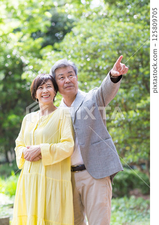 Senior couple enjoying the fresh greenery, couple, middle-aged, date, walk 125809705