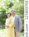 Senior couple enjoying the fresh greenery, couple, middle-aged, date, walk 125809708