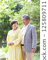 Senior couple enjoying the fresh greenery, couple, middle-aged, date, walk 125809711