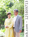 Senior couple enjoying the fresh greenery, couple, middle-aged, date, walk 125809713