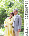 Senior couple enjoying the fresh greenery, couple, middle-aged, date, walk 125809714