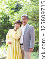 Senior couple enjoying the fresh greenery, couple, middle-aged, date, walk 125809715